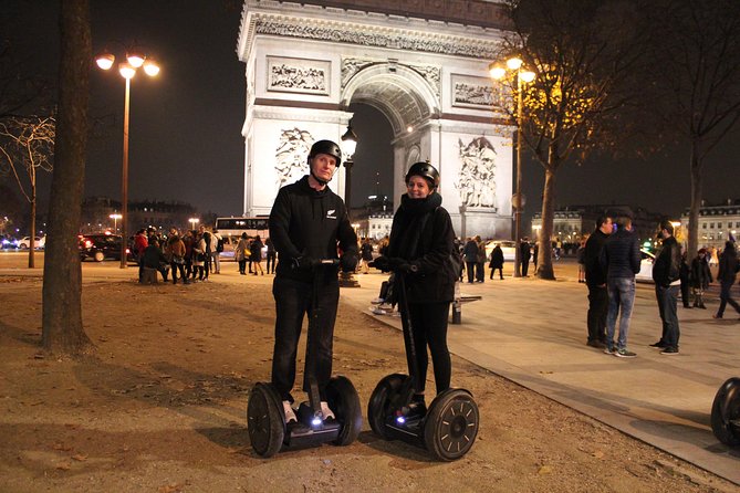 Paris by Night: Exclusive Segway night tour with a Local Guide - The Louvre and its famous pyramid after sunset