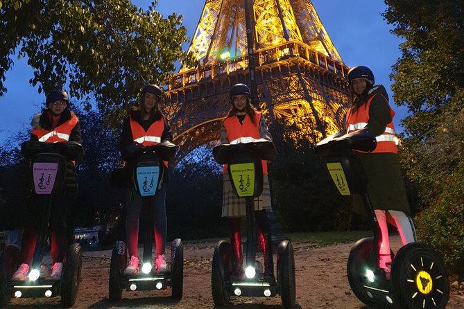 Segway by night ! Illuminated Paris - The Eiffel Tower lights up the evening